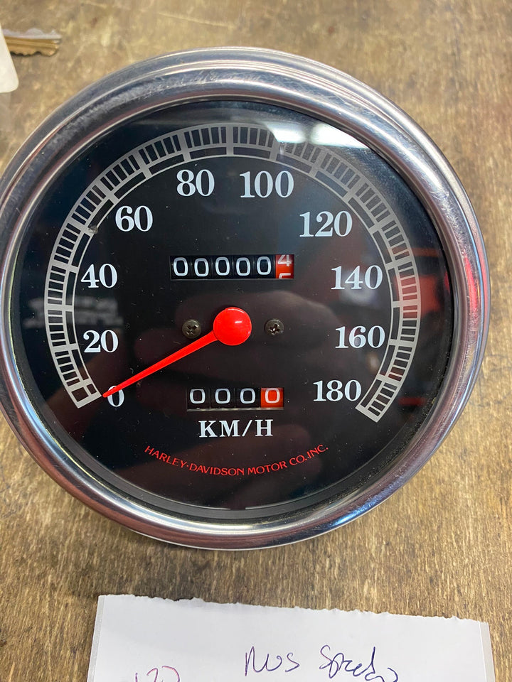 NOS HARLEY SPEEDOMETER DASH MOUNT HERITAGE SOFTAIL FATBOY KMH KILO VTG OEM FACTO